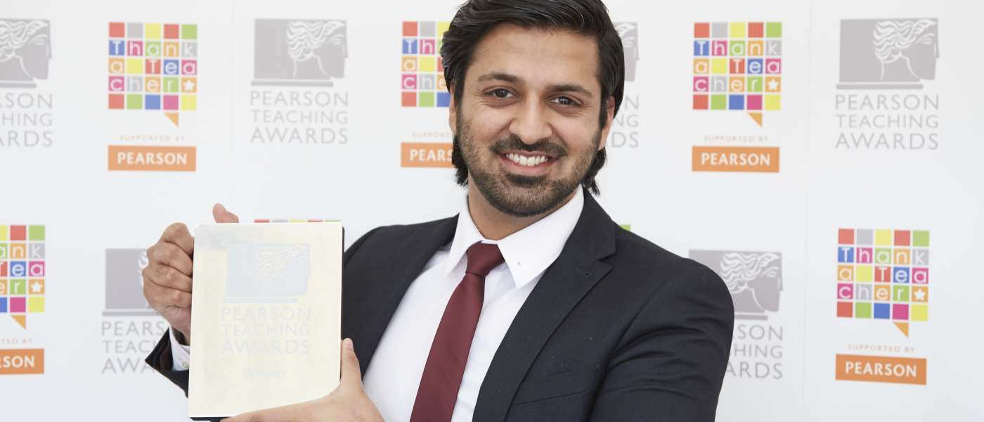 Adnan mahmood receiving a prize from pearson education earlier this year he s now been shortlisted for a us 1 million teaching award