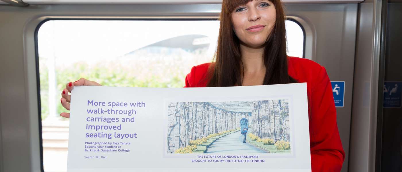 Photography foundation degree student inga tenyte with the elizabeth line poster on which her photograph is being used medium