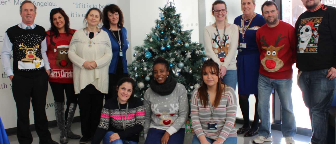 Staff at the technical skills academy in barking donning christmas jumpers for charity this week 9496