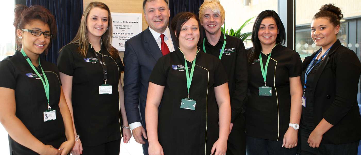 Strictly contestant and former education minister ed balls opening the technical skills academy pictured with some hair beauty students