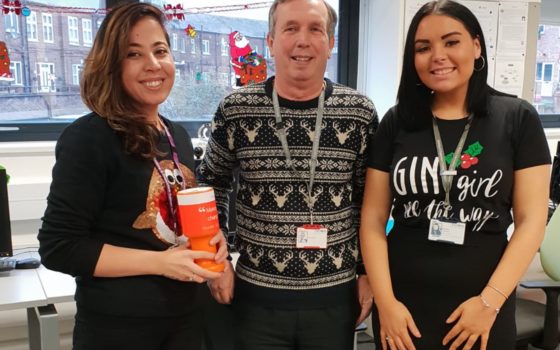 Beauty student laila hossaini lecturer john peacock and rebecca clements and administration apprentice at the technical skills academy in barking donning christmas jumpers for charity
