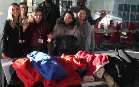 Enterprise students from barking dagenham college who collected 100 warm coats for homeless people with their tutor giuditta meneghetti on the far right