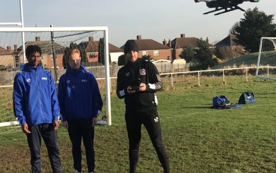 Football academy coach and lecturer james roach using the drone along with two students henry sleight 17 from dagenham and jahrius st louis 17 from ilford 2