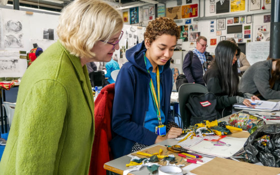 Ofsted chief inspector amanda spielman talking to a fashion student on a visit to barking dagenham college