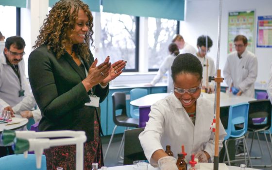 Student elizabeth otusanya shares an experiment with barking dagenham college s principal and ceo yvonne kelly in the new college s science lab