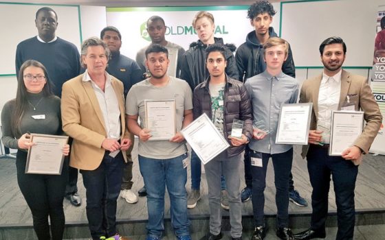 Students with the chairman of hotel chocolat and co founder of lush andrew gerrie second form left and their tutor adnan mahmood far right