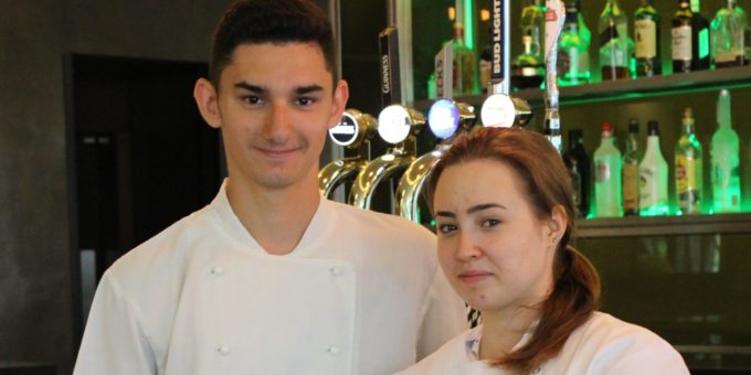Angelika toporowska pictured with another former technical skills academy student 19 year old george fodor who has worked at the hilton since graduating from the college last yea