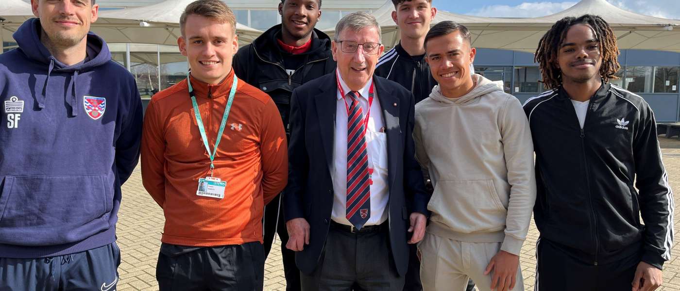 Steve Thompson MBE MD of Dagenham and Redbridge FC with Barking Dagenham College apprentices1