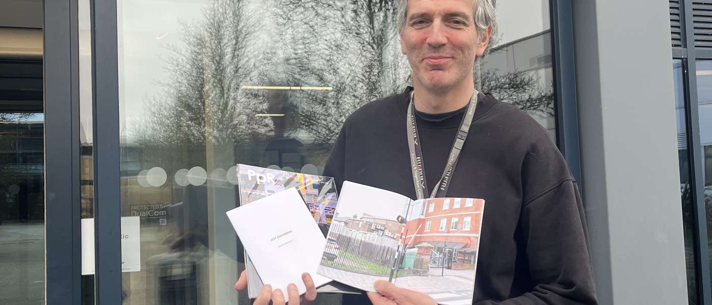 David Bennett with his new photobook outside Barking Dagenham College