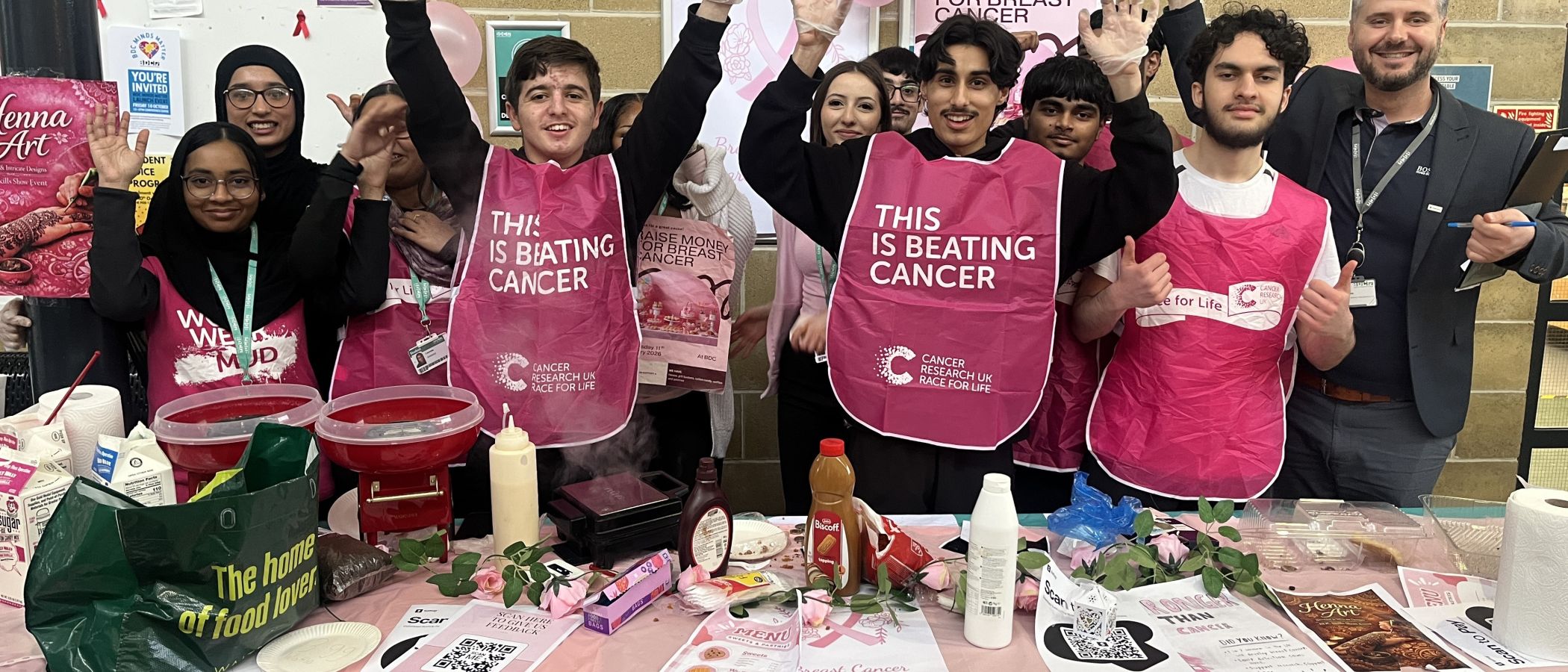 Business students with their tutor Dilon Beqa who raised 350 Cancer Research UK 2