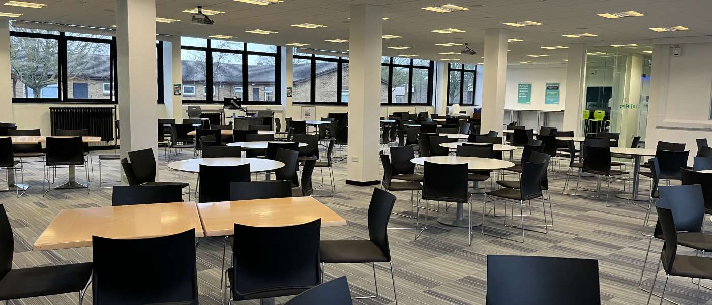 Conference centre at rush green campus with tables and chairs set up