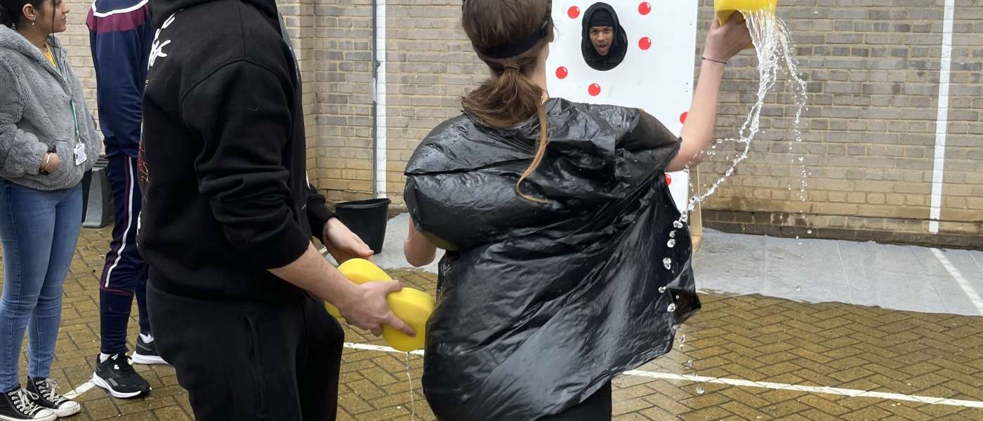 Students splat staff with wet sponges to raise money for Red Nose Day