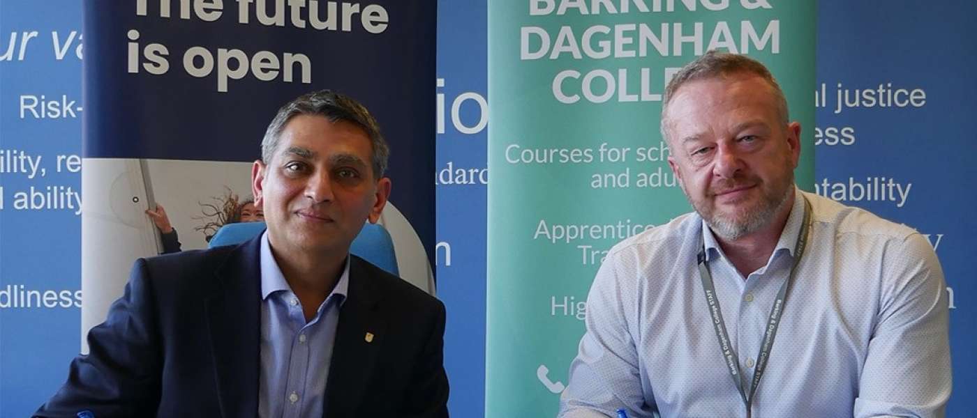 Cropped Viren Patel The Open University and Jason Turton Barking Dagenham College sign a memorandum of understanding