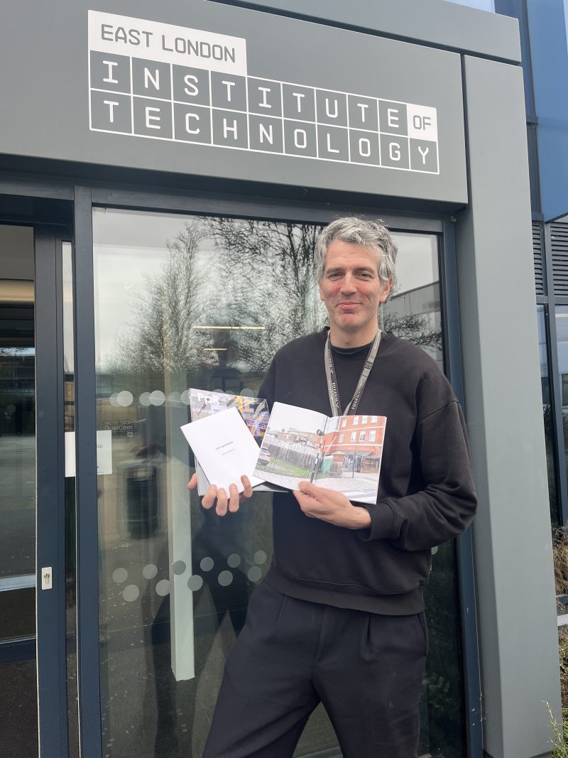 David Bennett with his new photobook outside Barking Dagenham College