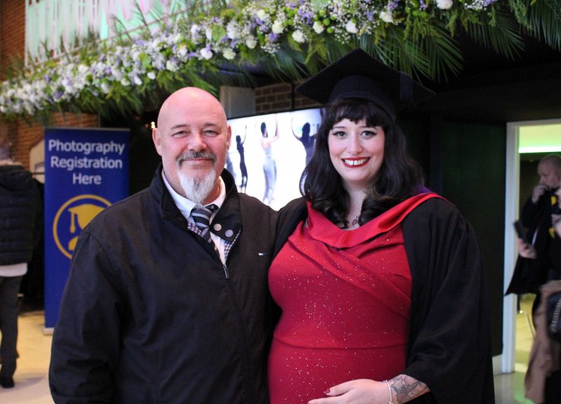 2022 Barking Dagenham College graduate Charley Peckett who obtained a Certificate in Education and Training pictured with a family member