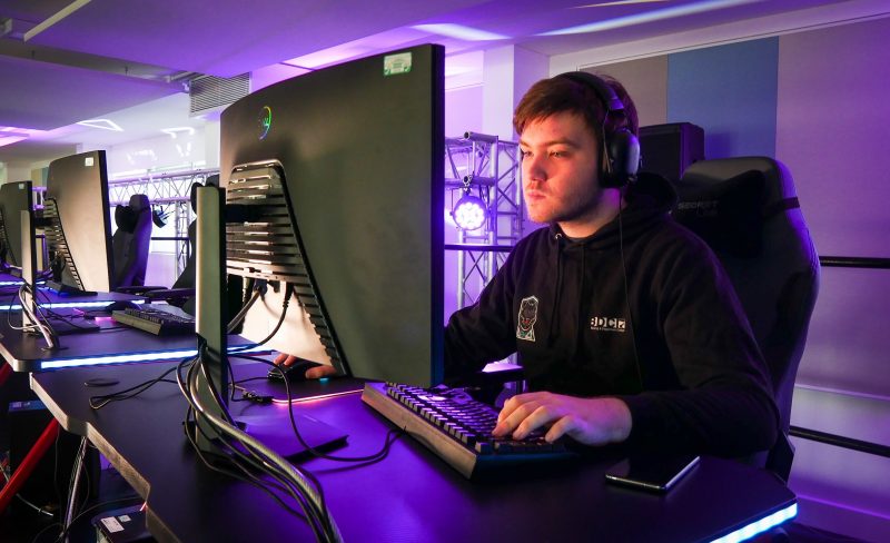 Alex Reece is one of the first cohort to complete the BTEC Esports pictured in the East London Institute of Technologys esports arena 2