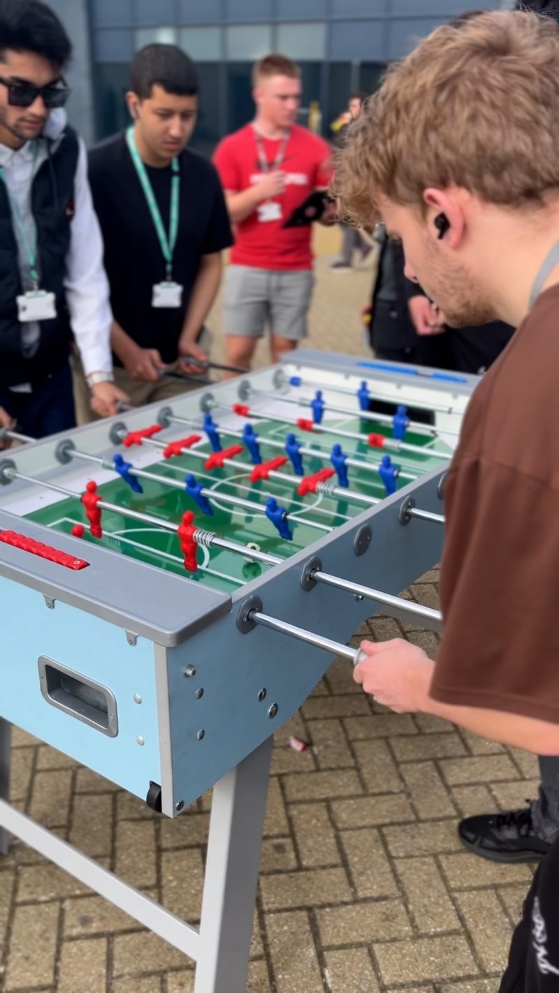 Freshers Fair at Barking Dagenham College Students enjoy table football