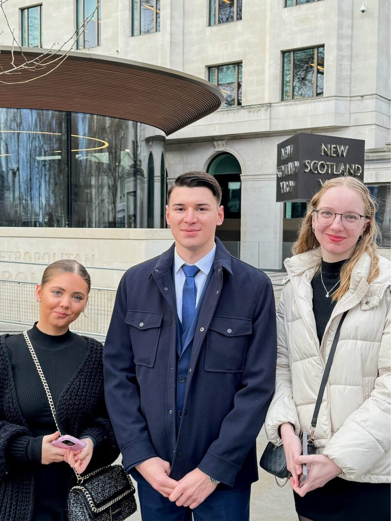 Protective Services students Annie Levey Artiom Josan and Darja Lukina outside New Scotland Yard
