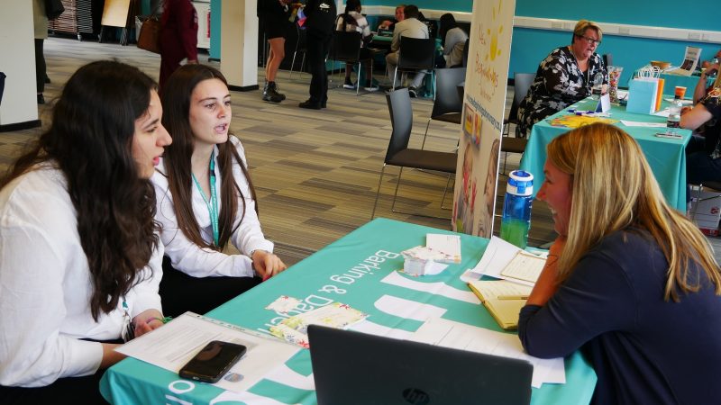 Students talking with New Beginnings Day Nurseries