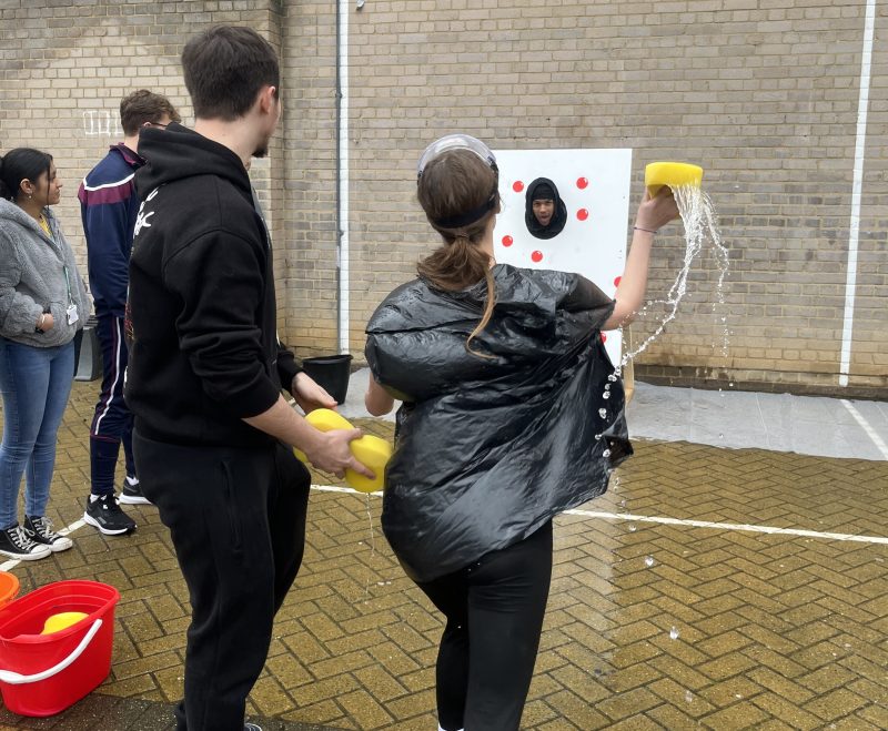 Students splat staff with wet sponges to raise money for Red Nose Day