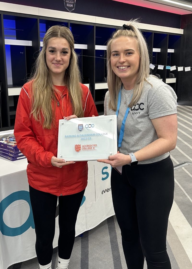 Womens Football Development Officer Kayleigh Heron received the plaque on behalf of the college from Beth Morrell National Football Development Coordinator ECFA