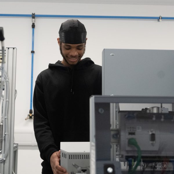 Daivam Djassi BTEC Engineering student at Barking Dagenham College in one of the Industry 4 0 labs which will be used in the World Skills competitions