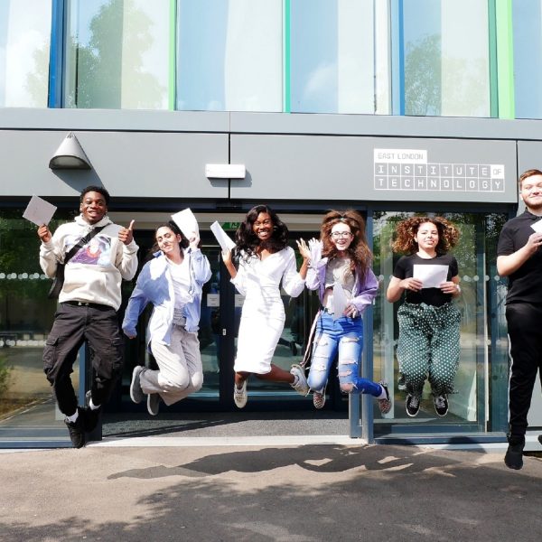 East London Institute of Technology BTEC students receiving their results JUMPING SHOT