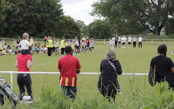 Sports students from Barking Dagenham College organised Rush Green Primary Schools sports day this week parents watch children in a relay race