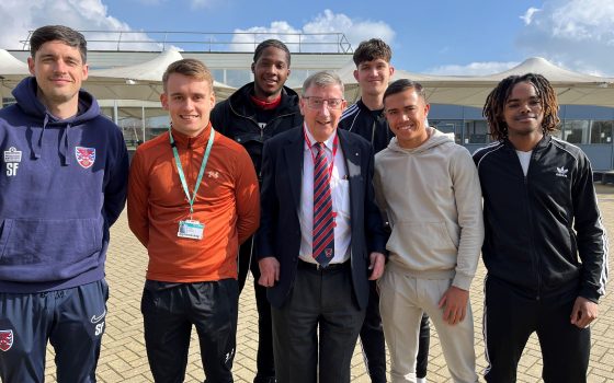 Steve Thompson MBE MD of Dagenham and Redbridge FC with Barking Dagenham College apprentices1