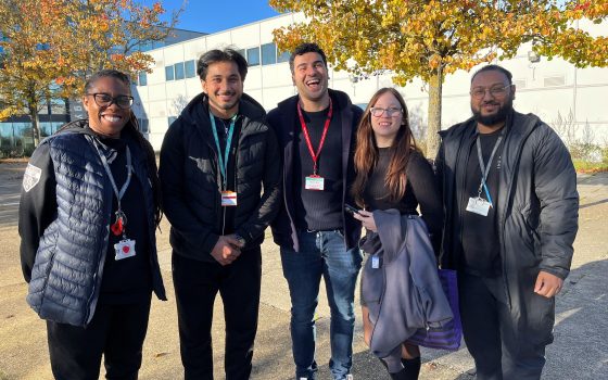 Olympic Sprinter Adam Gemili with teachers Gwen Edwards and Ikram Chowdhury and students Zain Usman and Lacey Ann F