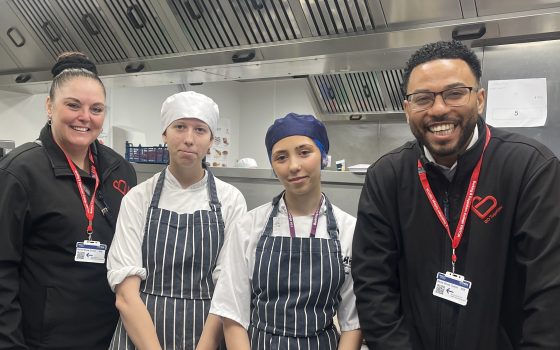 Hospitality students Amy Harvey and Chloe Gain with judges Lisa Morris and Fabio Jesus from BD Group