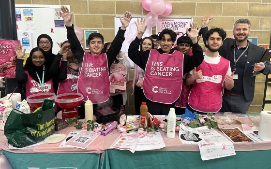 Business students with their tutor Dilon Beqa who raised 350 Cancer Research UK 2