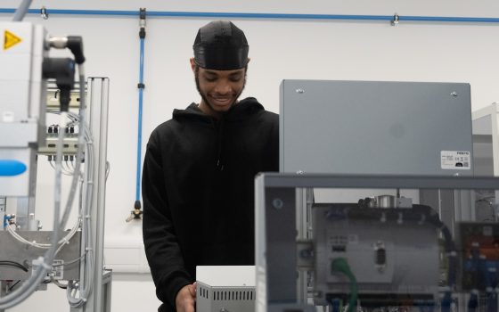 Daivam Djassi BTEC Engineering student at Barking Dagenham College in one of the Industry 4 0 labs which will be used in the World Skills competitions