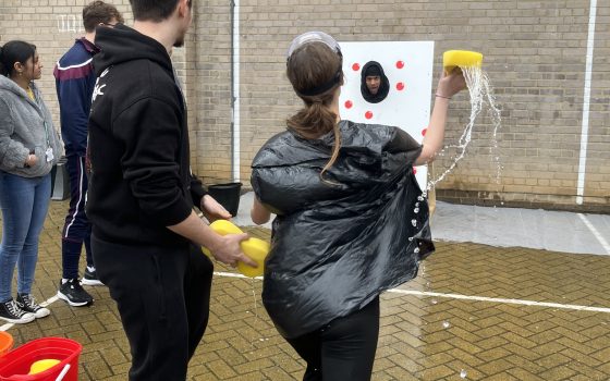 Students splat staff with wet sponges to raise money for Red Nose Day