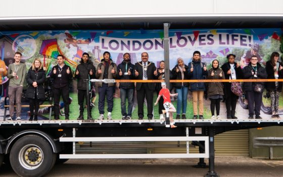 The Mayor of Barking Dagenham Cllr Peter Chand taking part in a secret unveiling of the float with the college students and staff who worked on it