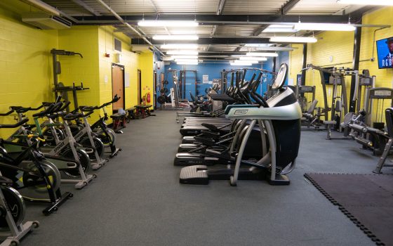 Rush Green Campus gym showing treadmills, bikes and other fitness equipment, including a TV